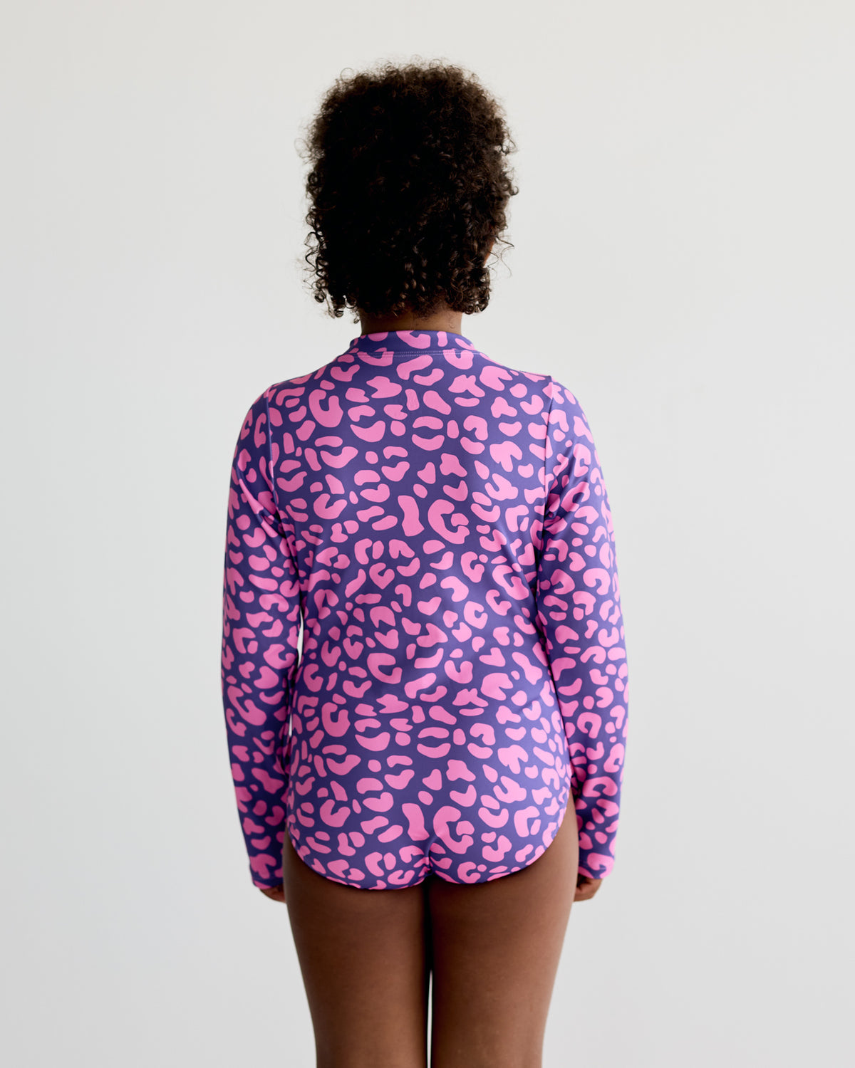 Pink Purple Safari Leopard print on purple long-sleeve kids swimwear swimming costume with UPF50+ sun protection and nylon fabric.