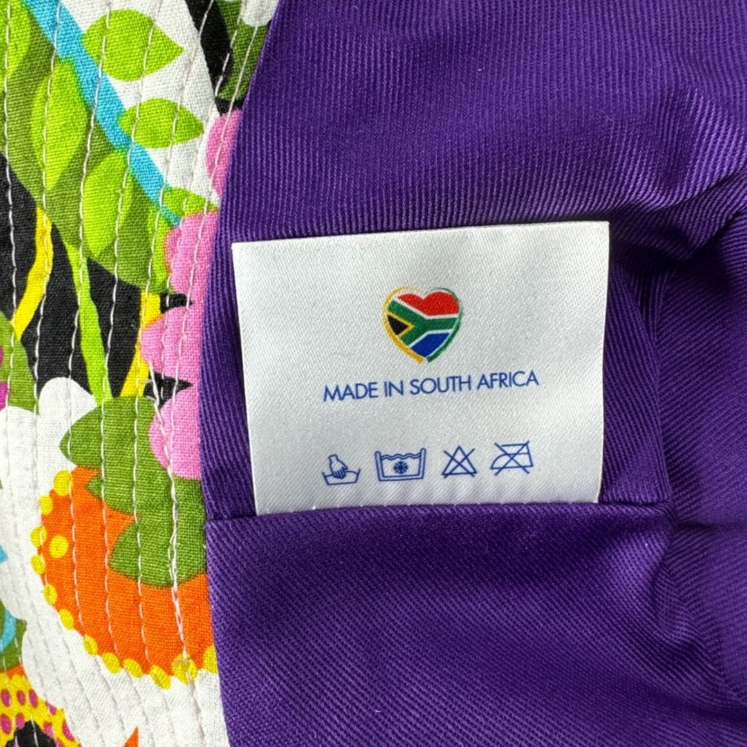 Girls Bright Floral Flowers Print Bucket Hat. Extra wide brim for sun protection. UPF50+ Adjustable strap.