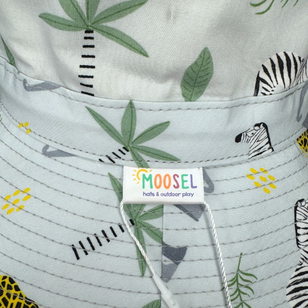 Grey Fabric with Safari Animals Printed Bucket Hat. Extra wide brim for sun protection. UPF50+ Adjustable strap for windy days.