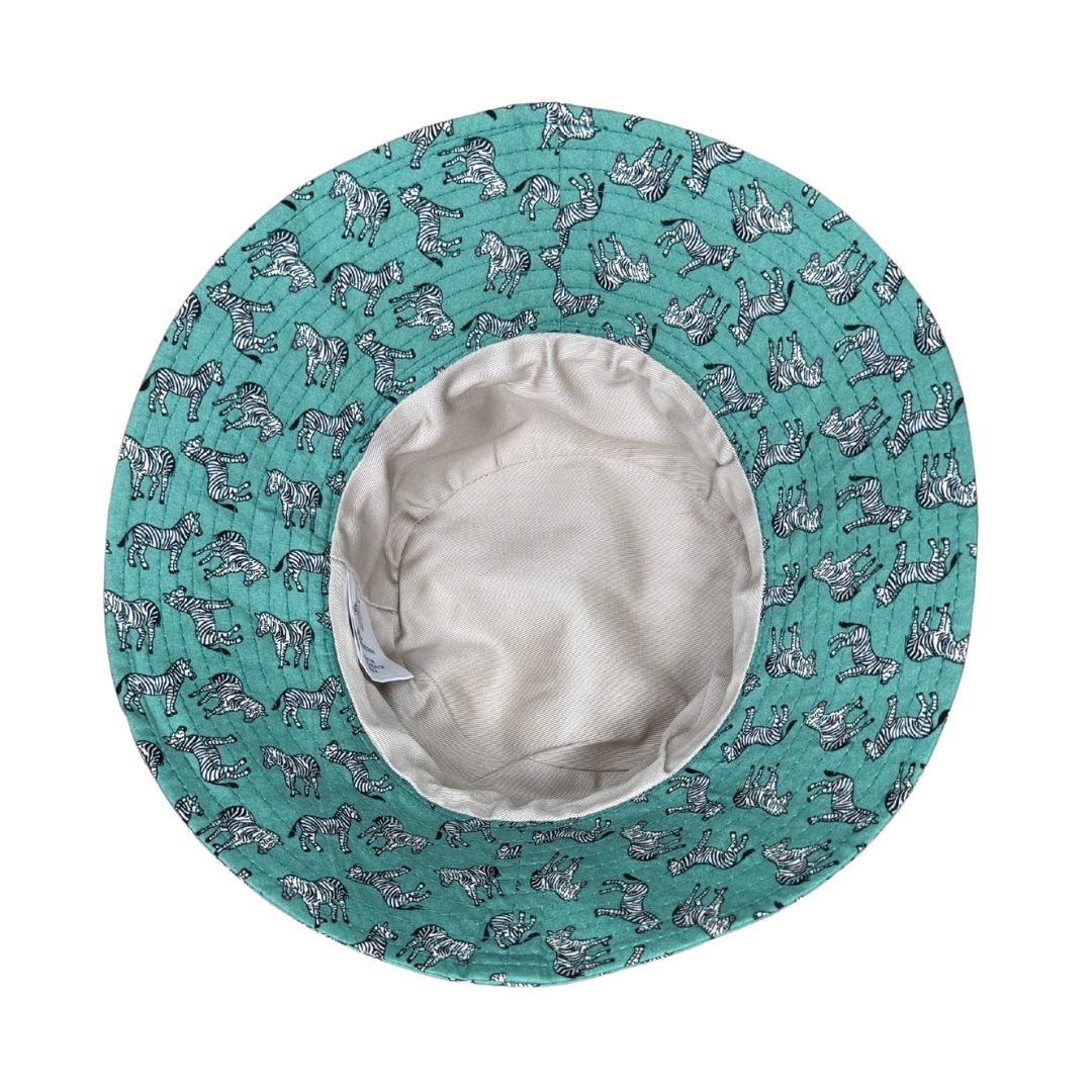 Green Fabric with Zeba Animals Print Bucket Hat. Extra wide brim for sun protection. UPF50+ Adjustable strap for windy days.