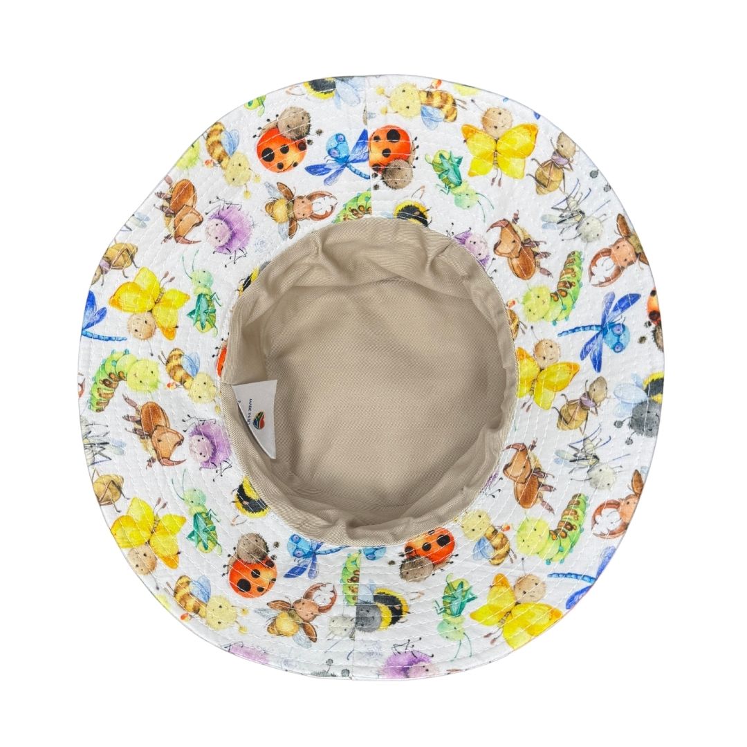 Kids Garden Bugs Print Bucket Hat. Extra wide brim for sun protection. UPF50+ Adjustable strap for windy days.