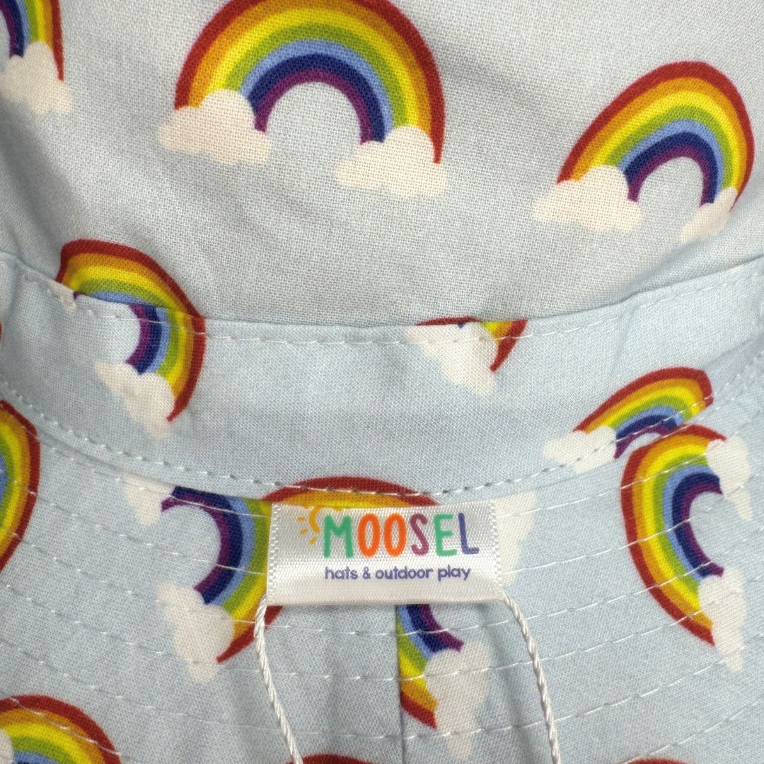 Baby Blue Fabric with rainbows clouds Print Bucket Hat. Extra wide brim for sun protection. UPF50+ Adjustable strap for windy days.