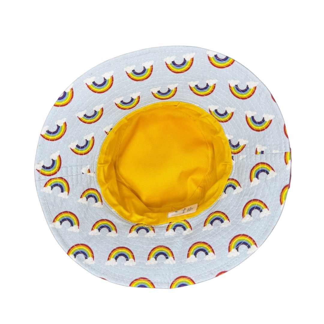 Baby Blue Fabric with rainbows clouds Print Bucket Hat. Extra wide brim for sun protection. UPF50+ Adjustable strap for windy days.