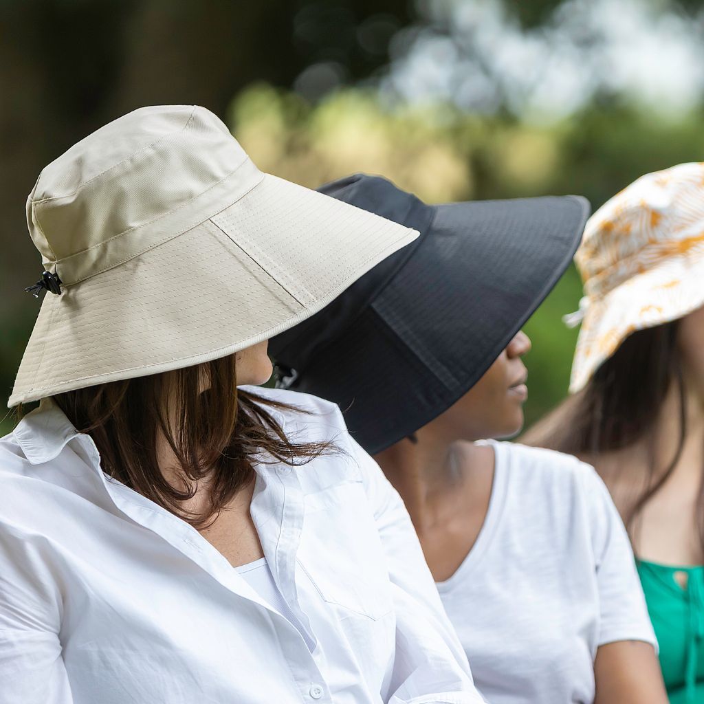 Women Ladies Black Extra Cover Bucket Hat. Extra wide brim for sun protection. UPF50+ Adjustable strap. Bestselling ladies hat.