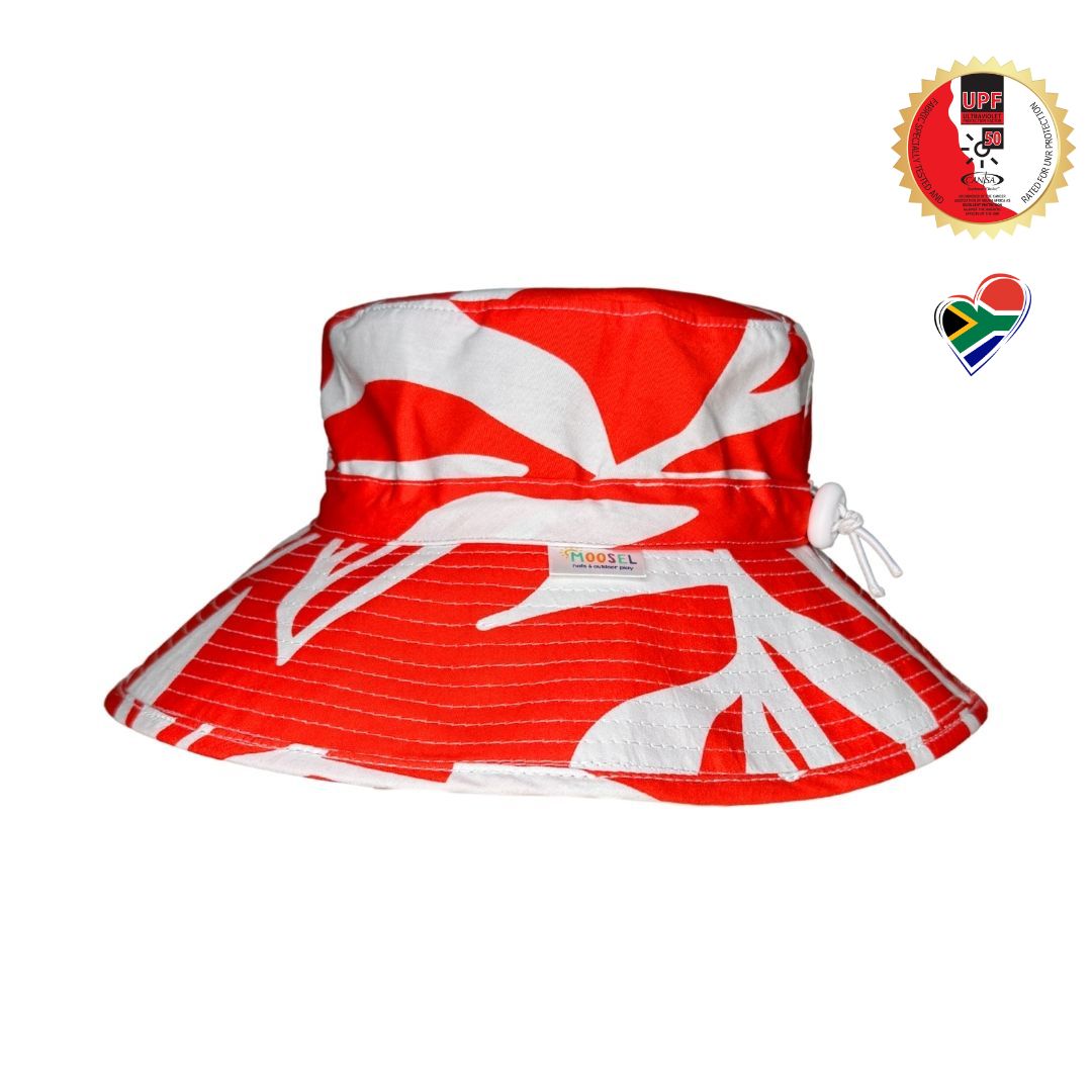 Red & White Tropical Print Bucket Hat. Extra wide brim for sun protection. UPF50+ Adjustable strap for windy days.