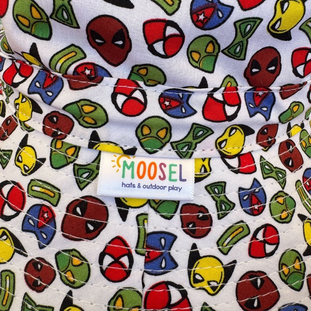 Boys Superhero faces Bucket Hat. Extra wide brim for sun protection. UPF50+ Adjustable strap.