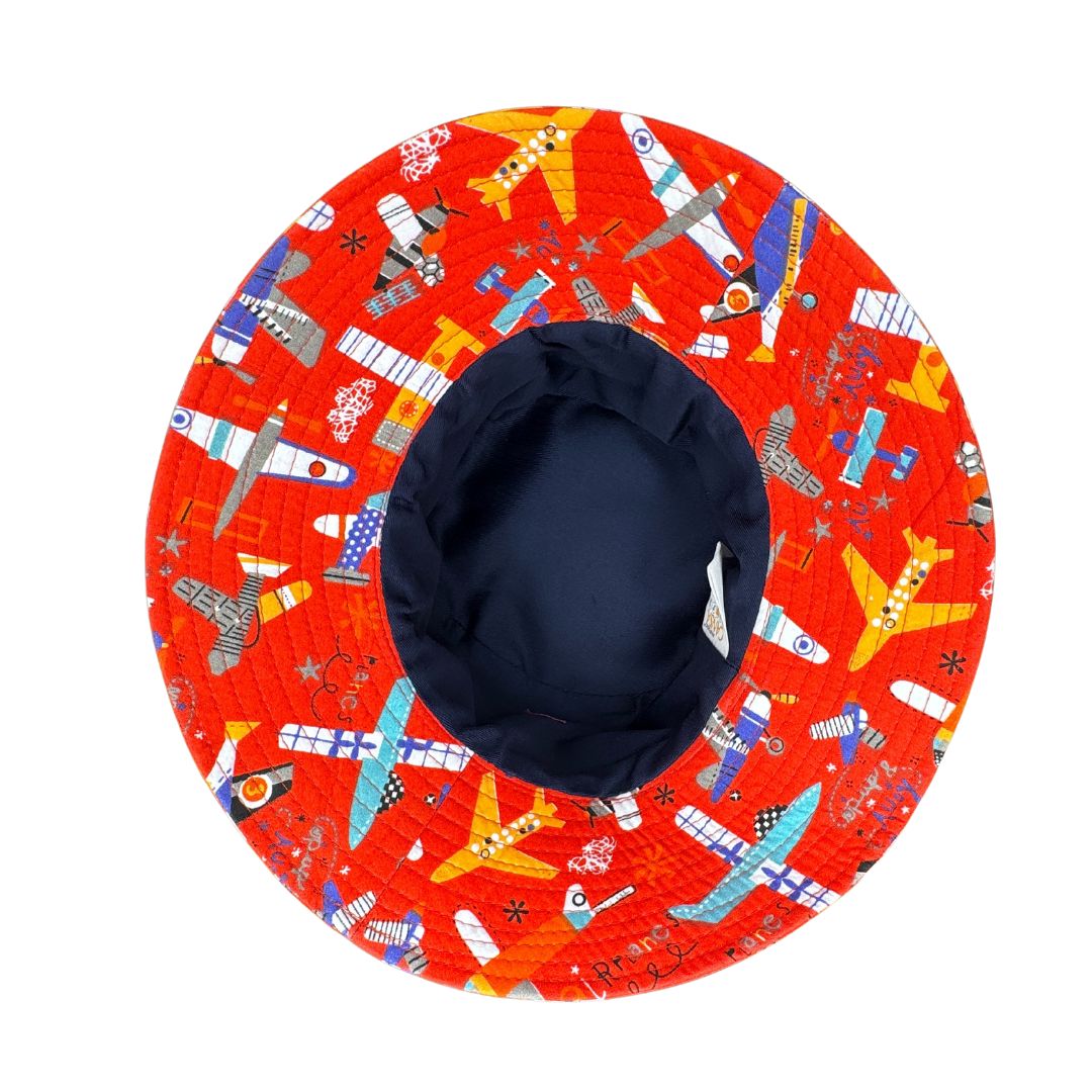Boys Red Planes Sky Bucket Hat. Extra wide brim for sun protection. UPF50+ Adjustable strap.