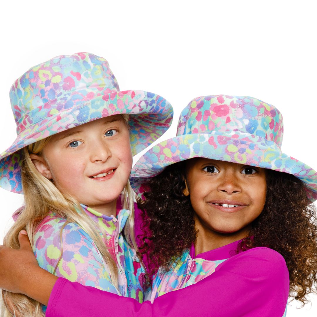 Girls Leopard Print Pink Purple Bucket Hat. Extra wide brim for sun protection. UPF50+ Adjustable strap.