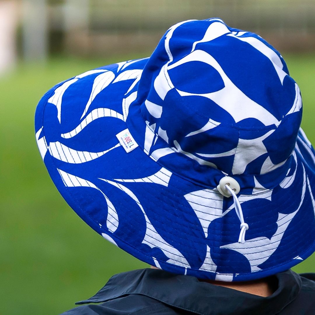Navy & White Print Bucket Hat. Extra wide brim for sun protection. UPF50+ Adjustable strap for windy days.