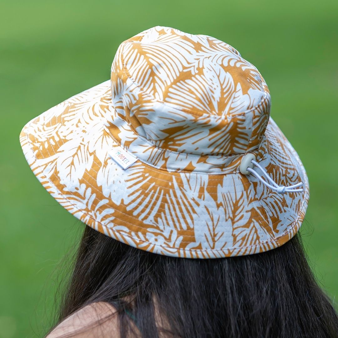 Golden Mustard Tropical Floral Bucket Hat. Extra wide brim for sun protection. UPF50+ Adjustable strap.